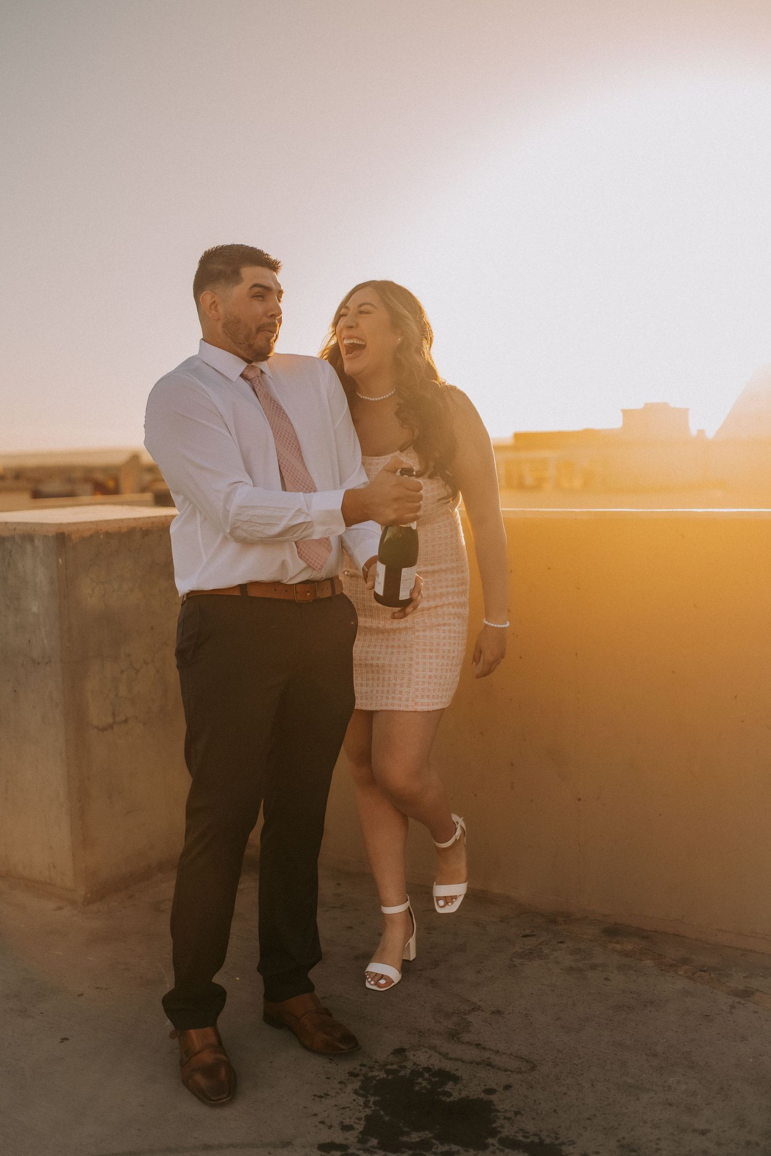 Albuquerque engagement photographer, engagement photos in albuquerque, rooftop engagement session, romantic and fun engagement session