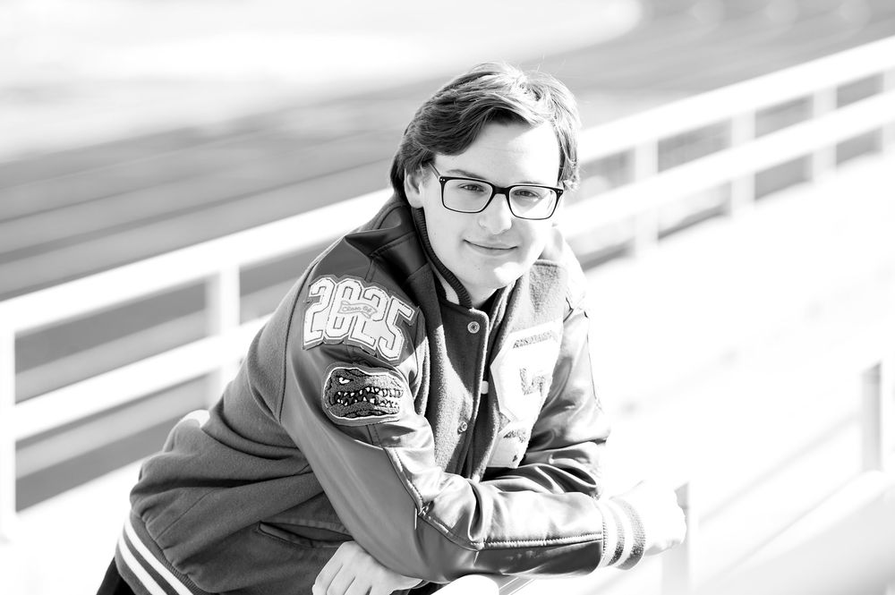 Black and white portrait series on bleachers showing various casual poses.