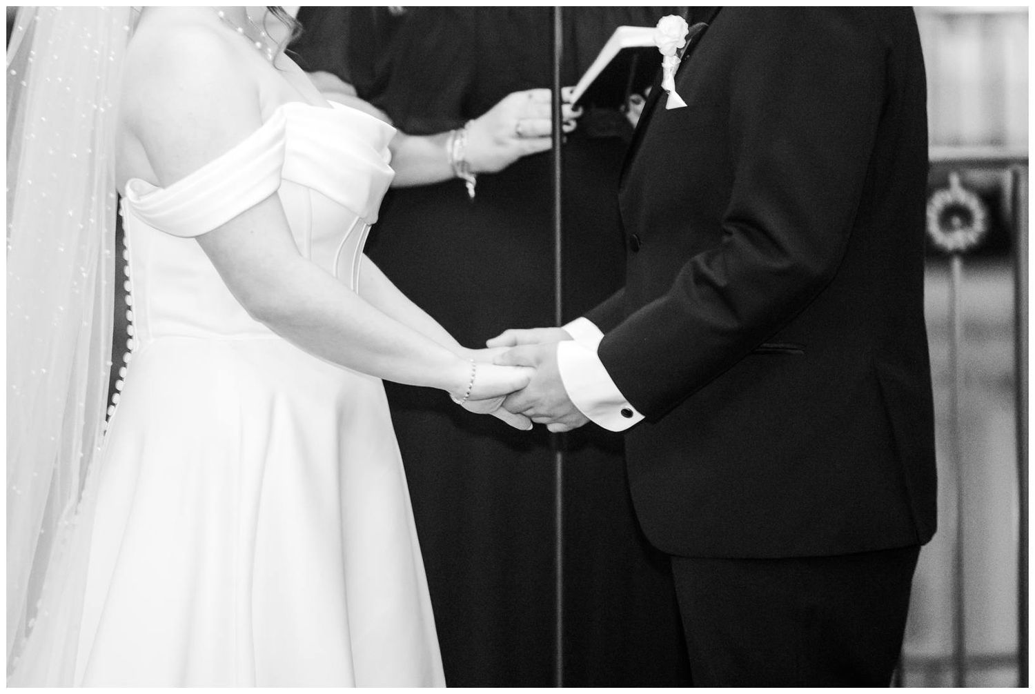 A romantic black and white wedding sequence showing tender moments between a couple in formal attire.