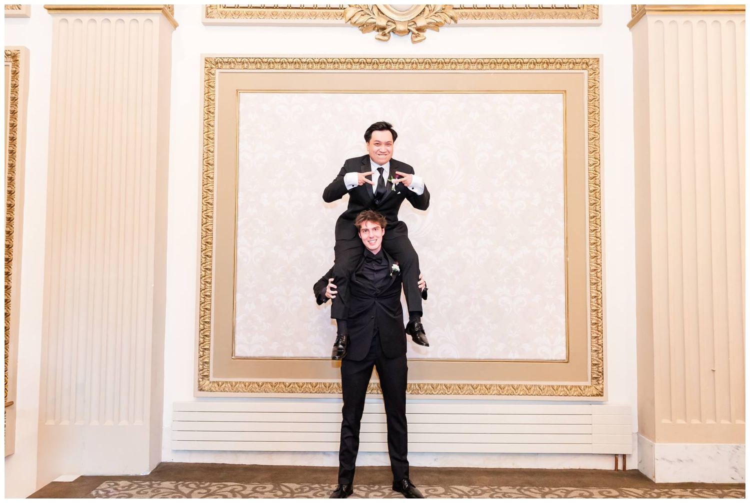 Creative wedding party photo sequence showing playful poses against a classic beige wall with gold trim.