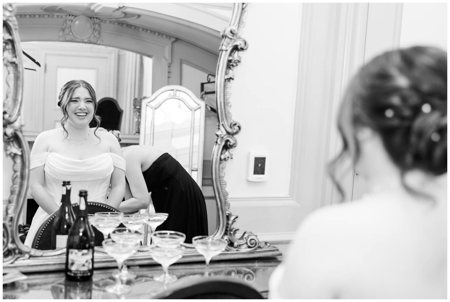 Wedding preparations captured in black and white through a series of candid moments in elegant interior settings.