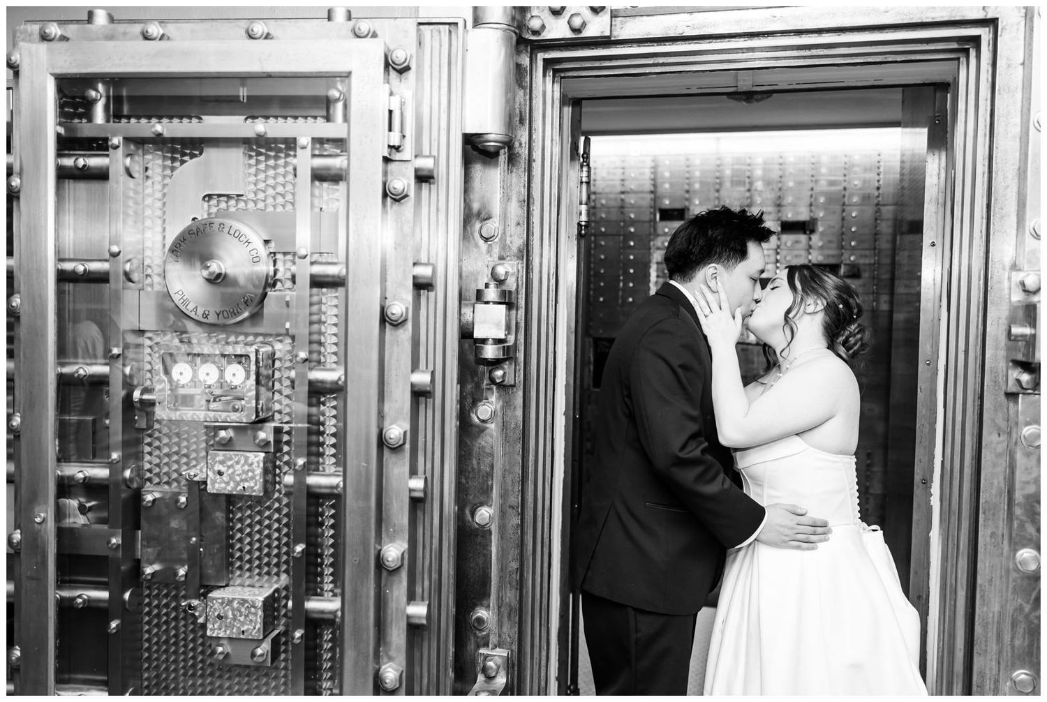 Black and white photos of couple posing in front of vintage elevator doors.
