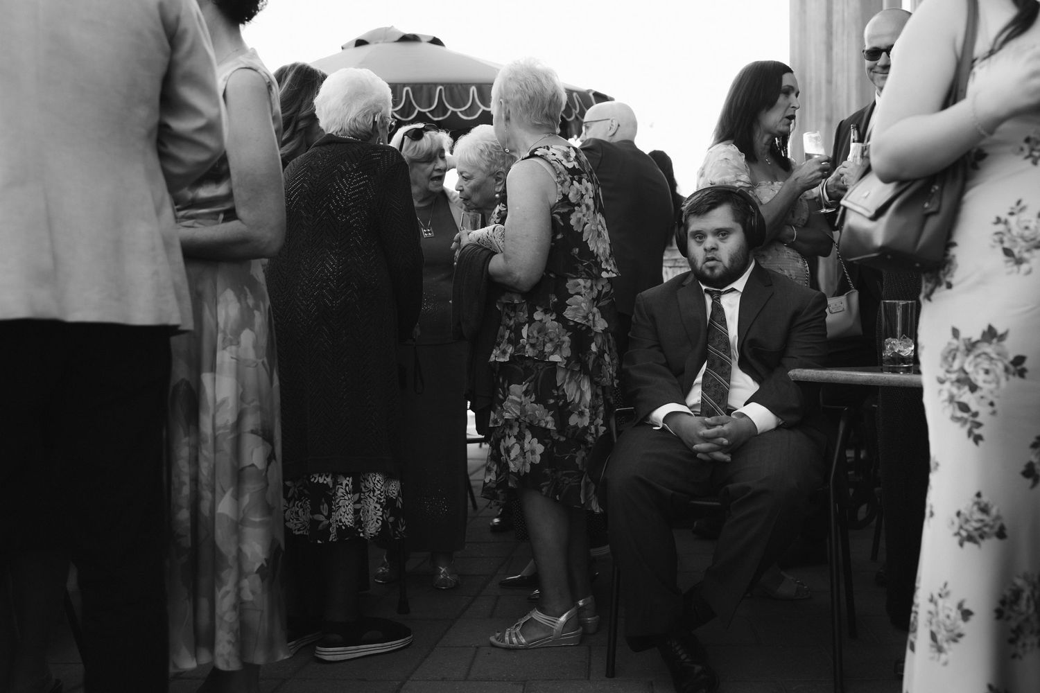 A crowd of people gathered at what appears to be a social event or celebration.