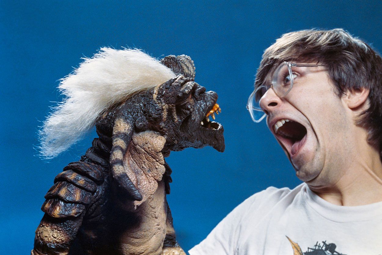 Chris Walas with a Stripe Gremlin puppet