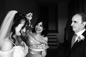 Black and white wedding photos capturing intimate moments between the wedding party.