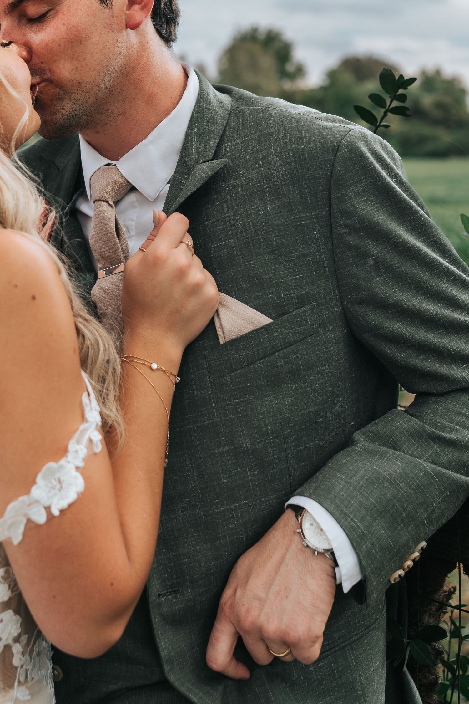 A romantic wedding photo series showing a couple in intimate poses against a natural outdoor backdrop.