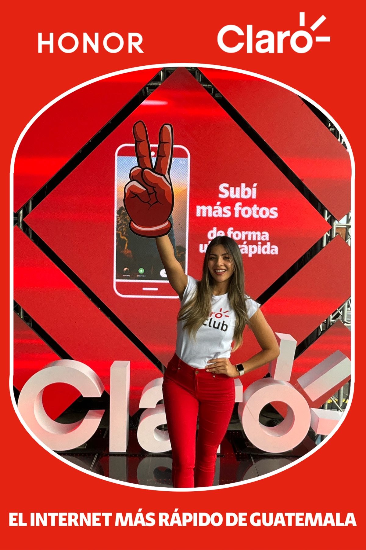 Promotional advertisement for Claro mobile service in Guatemala showing a red display with Honor branding and peace sign gesture.