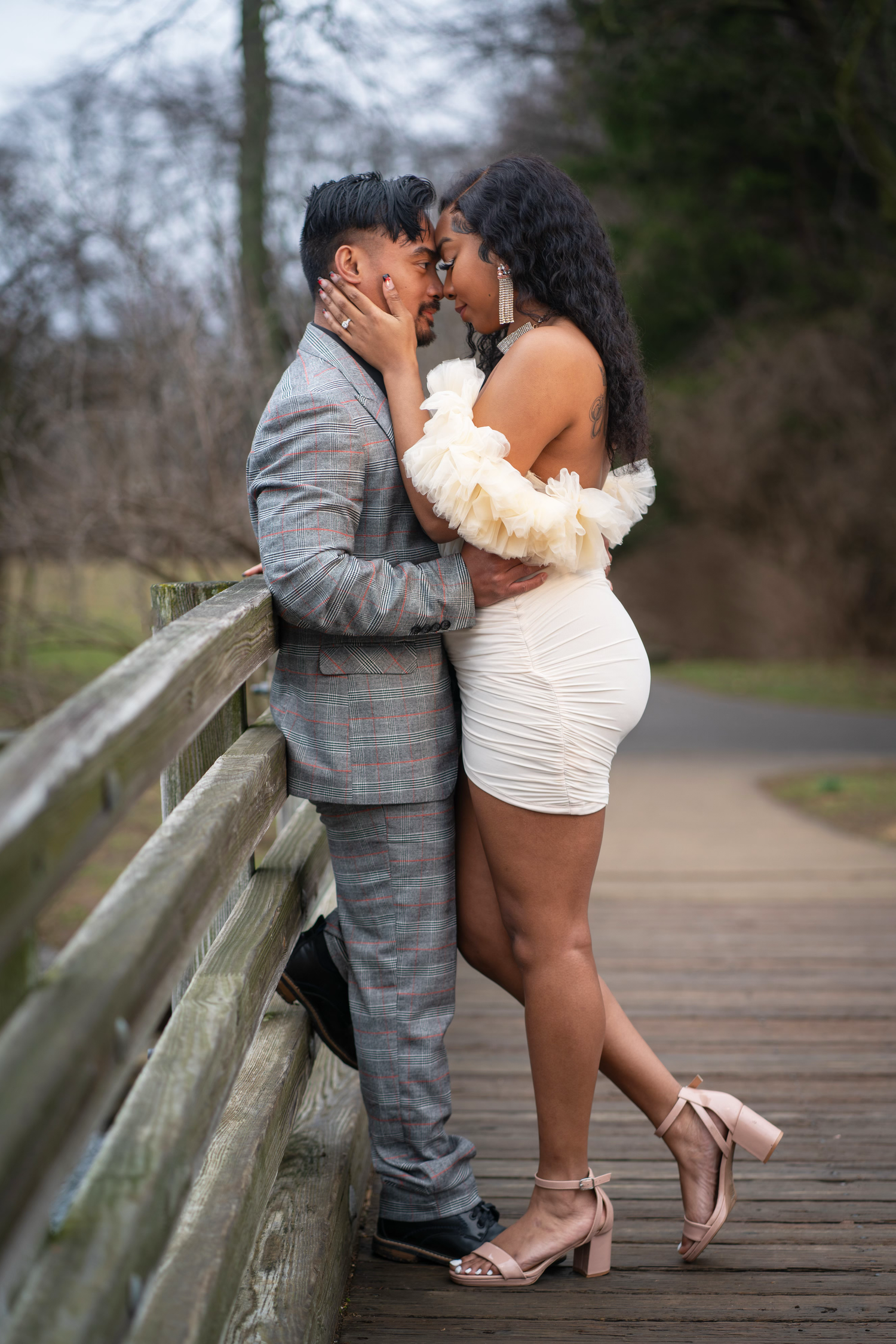engaged couple shares romantic moments for a photoshoot