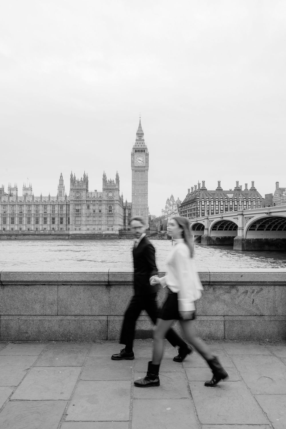 A sequence of black and white photos showing two people fighting on Westminster Bridge with Big Ben in the background.