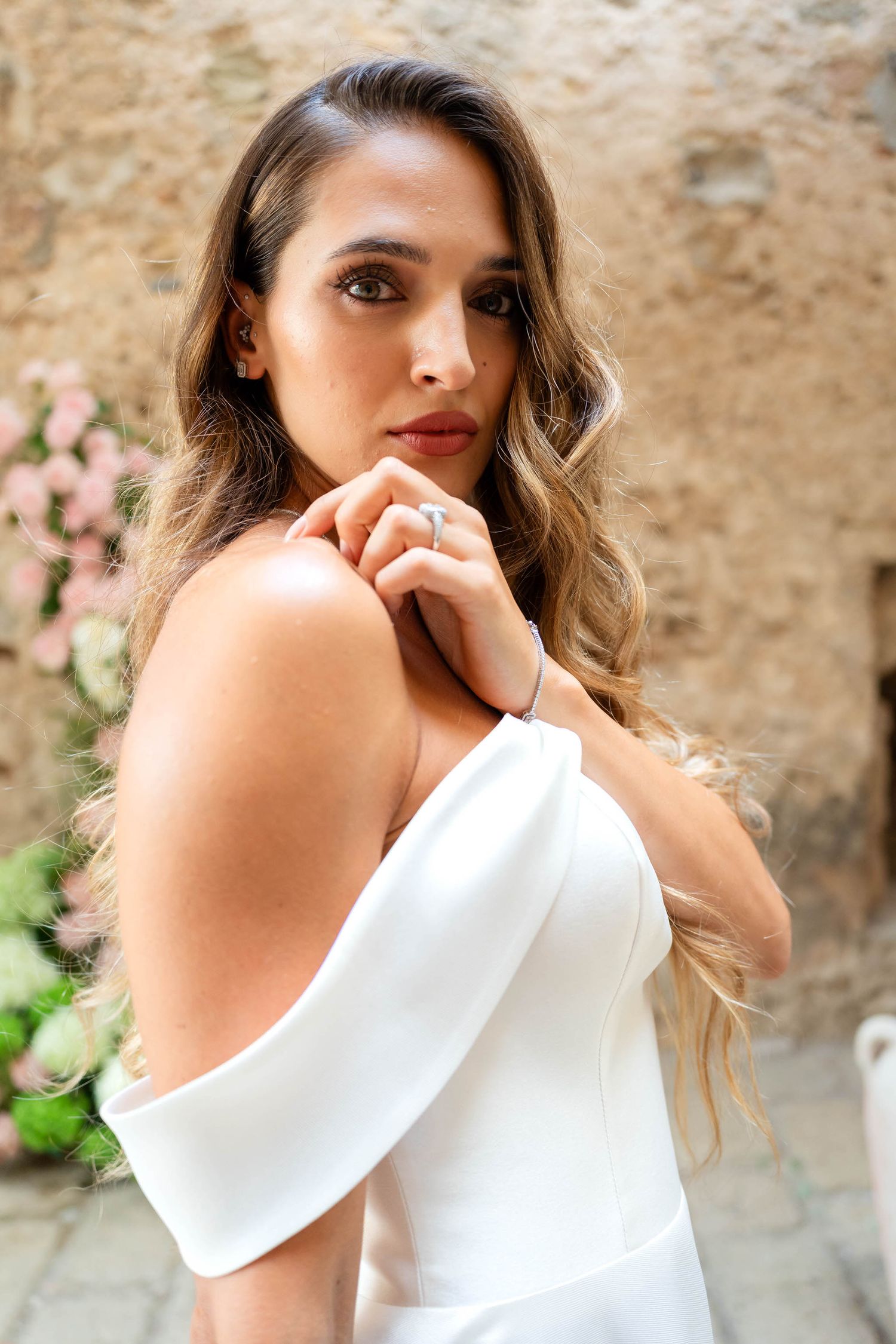 Editorial wedding portrait in Puglia countryside with golden light