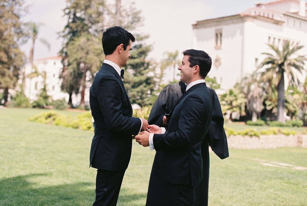35mm Film photo of a civil wedding ceremony at the Santa Barbara Courthouse featuring a gay couple.