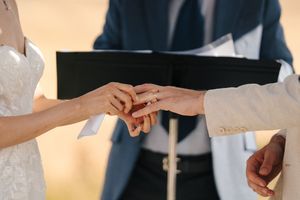 Close-up of hands during a business meeting showing professional interaction and engagement.