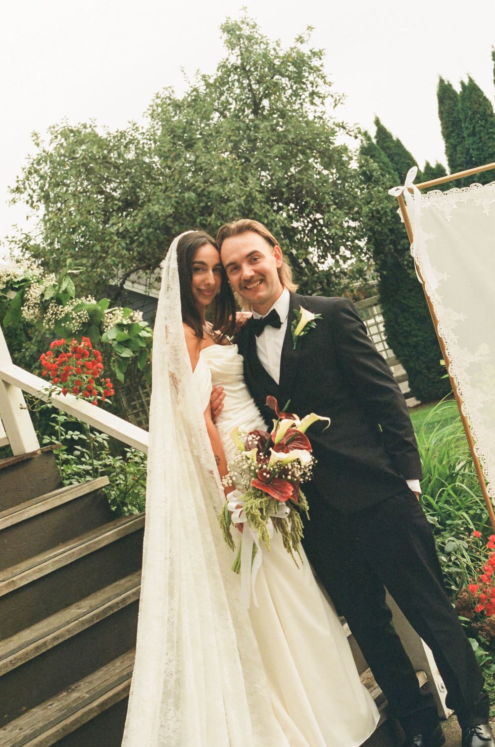 A series of romantic wedding photos showing a couple on outdoor steps with flowers and greenery in the background.