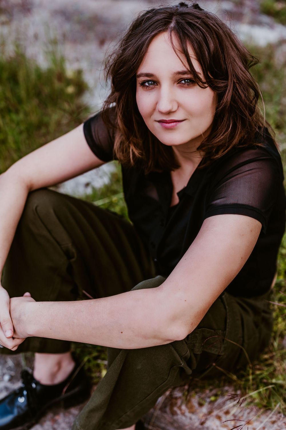 A series of casual outdoor portrait photos showing someone in a black top against a natural background.