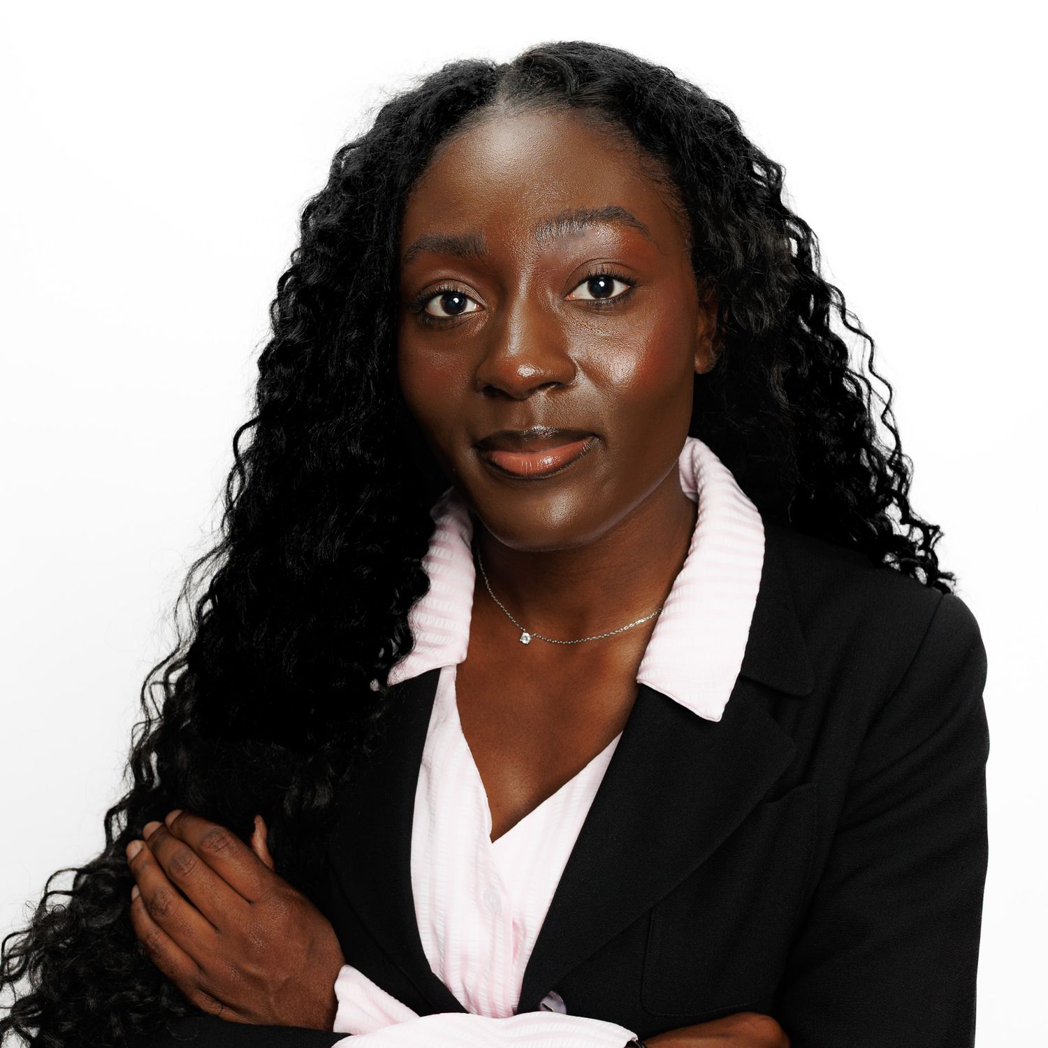 Professional headshots showing different poses in business attire against white background.