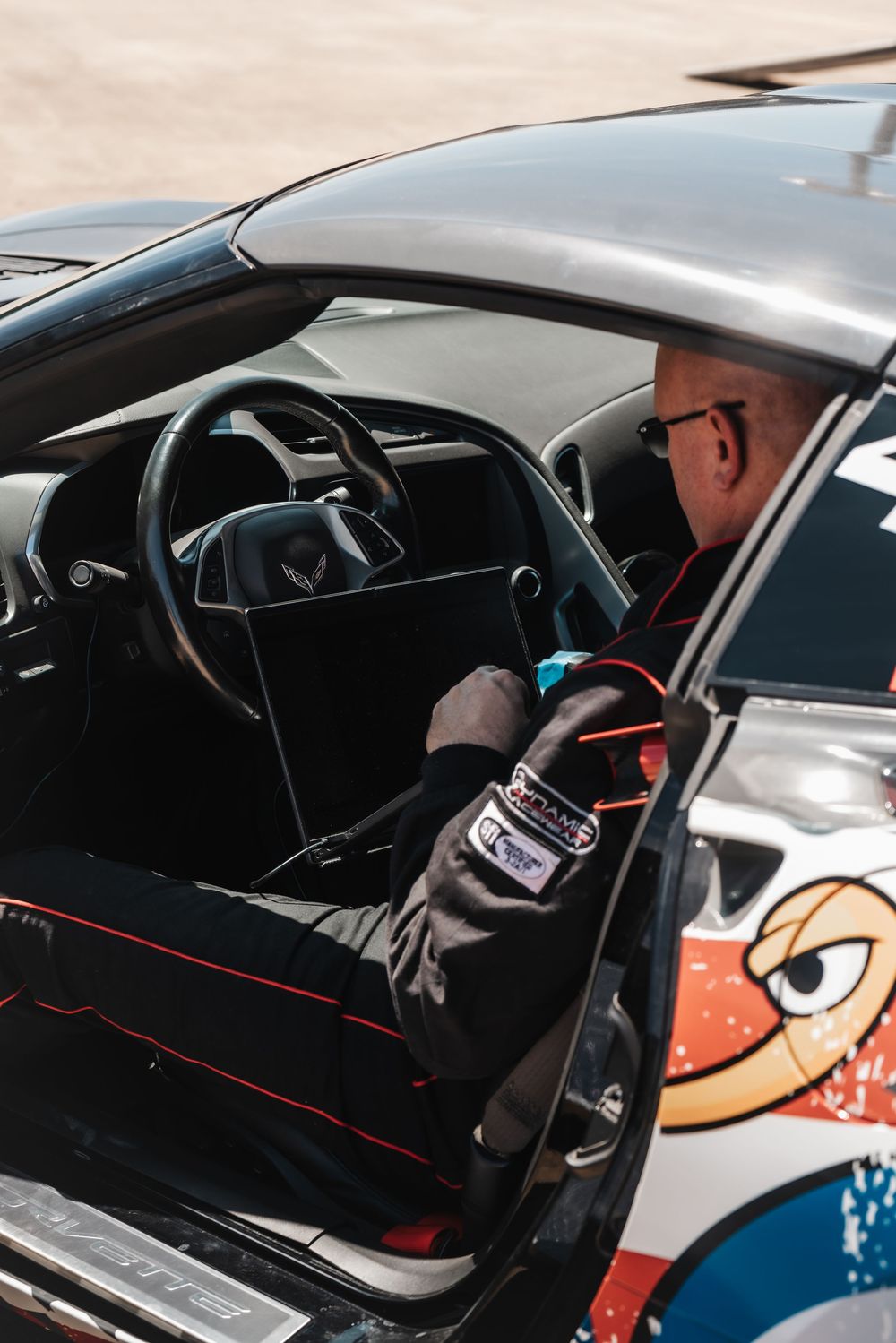 A series of interior car photos showing the dashboard and steering wheel from different angles and perspectives.