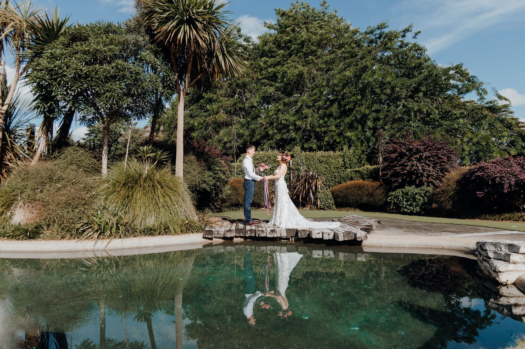 Newly wed couple enjoying their moment in a private venue. Captured by Apertured Media-Auckland Wedding Photographer