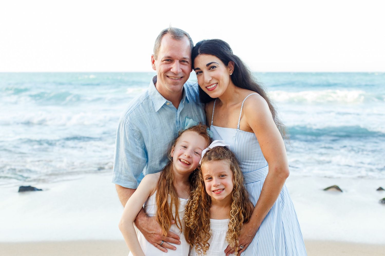 Family portrait on the beach. San Juan, Puerto Rico.