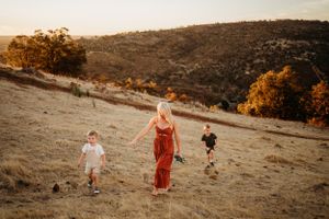 Multiple candid moments captured on a hillside during a warm sunset.