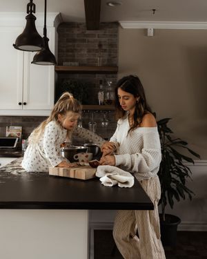 Cozy kitchen scene with baking activities and modern farmhouse decor.