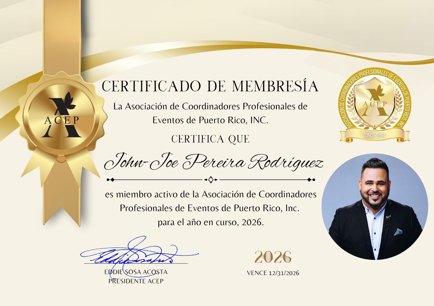 A formal gold and navy blue membership certificate with a decorative seal and signature at the bottom.