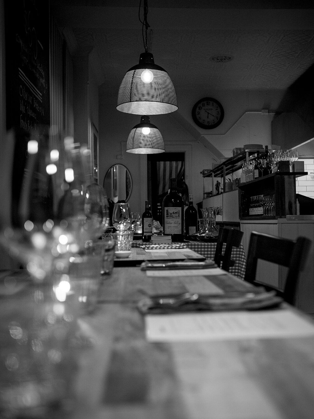 Bistro St Jacques
Long shot of table setting with wine glasses