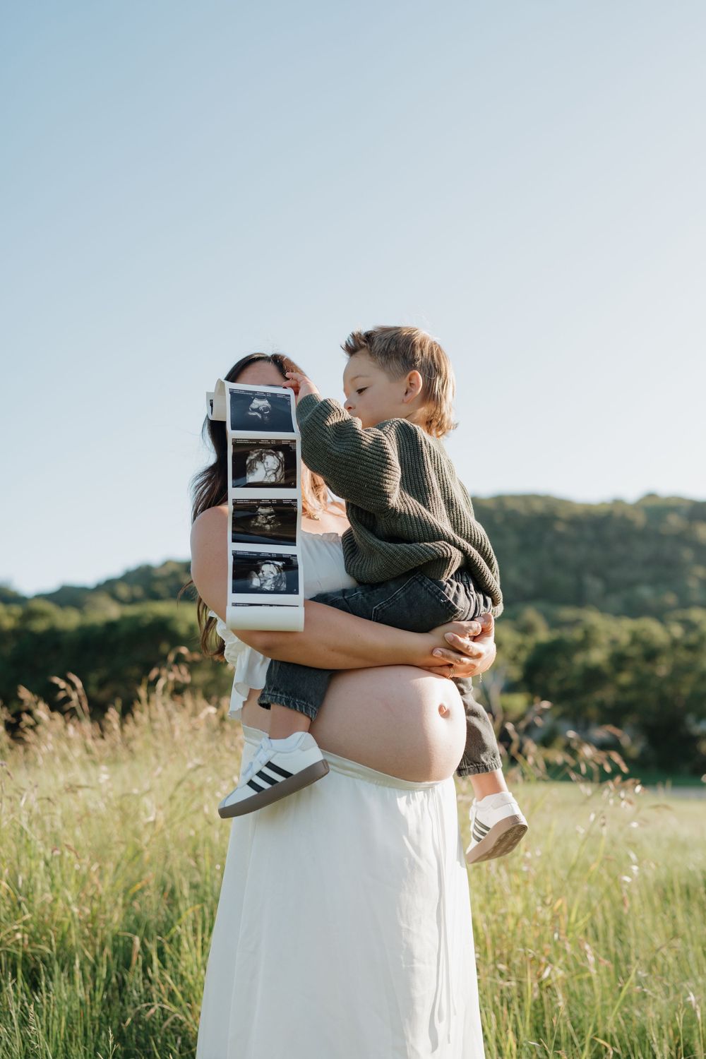 Candid documentary style maternity photo at Carmel Valley Ranch in Carmel, CA