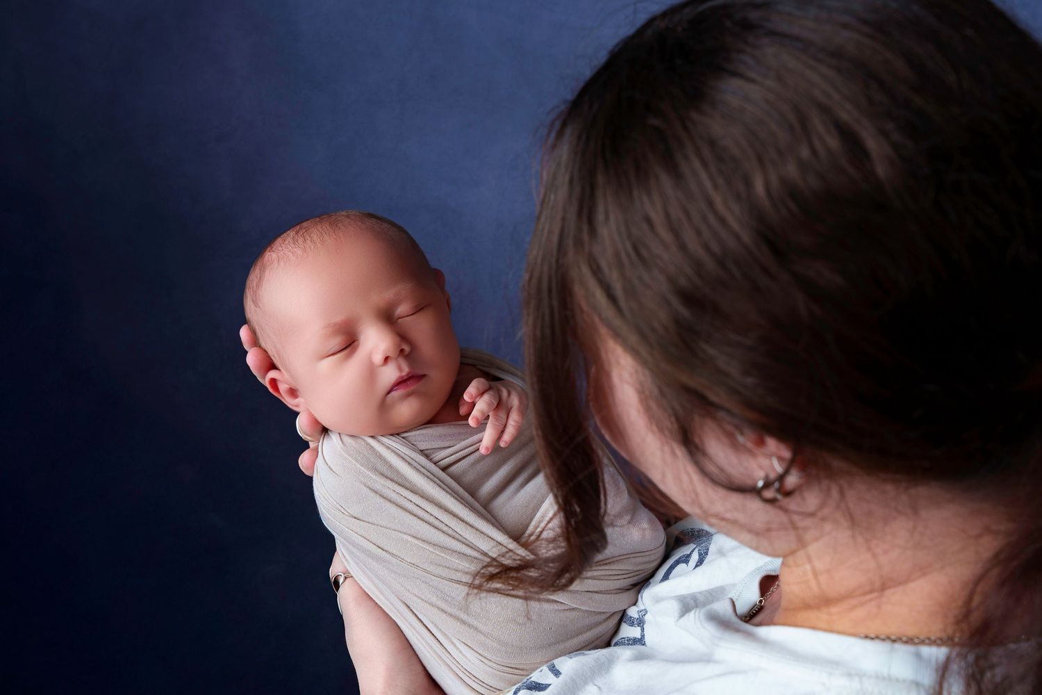 midland tx photographer photographers midland tx newborn photographer midland tx wrapped newborn sleeping posed baby family newborn session