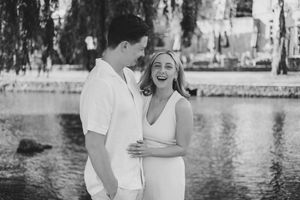 Couple celebrating their engagement in Bourton-on-the-Water.