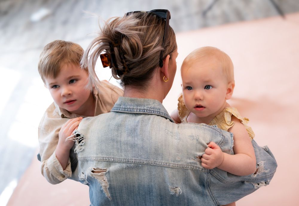 mother and kids posing for family session photography at gorilla studio