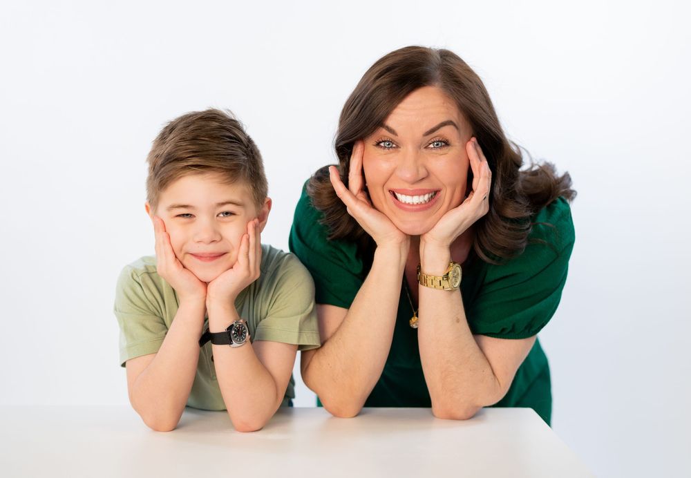 mother and son posing for family session photography at gorilla studio