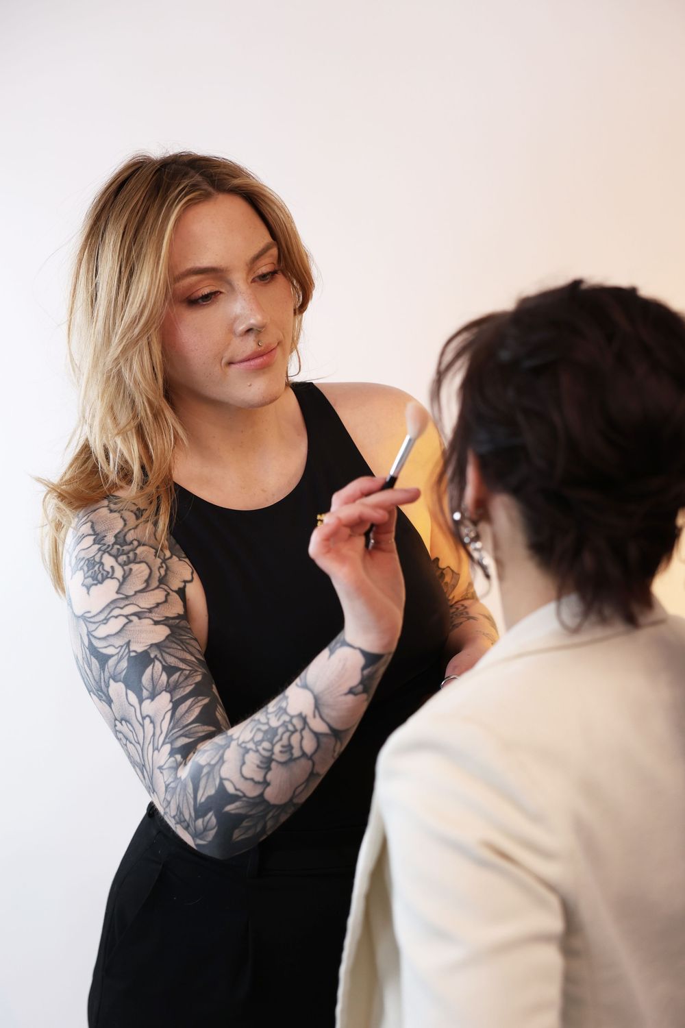 makeup artist posing for branding photography at gorilla studio