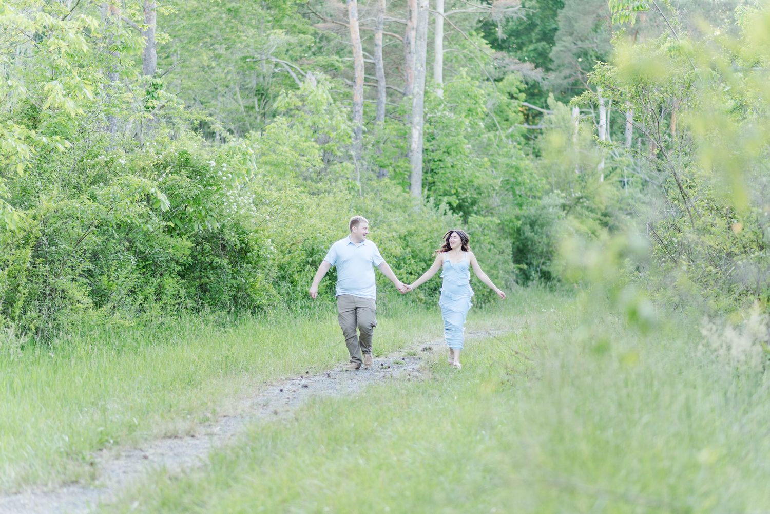 Engagement session at Quemahoning Reservoir in Johnstown Pennsylvania, running together