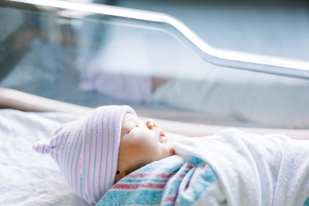 Newborn baby in hospital bassinet during Fresh 48 session at Piedmont Augusta
