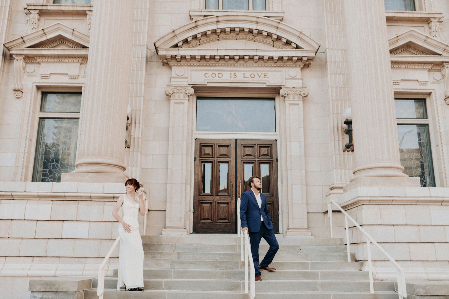 Editorial engagement portrait in front of Dallas County Records Building