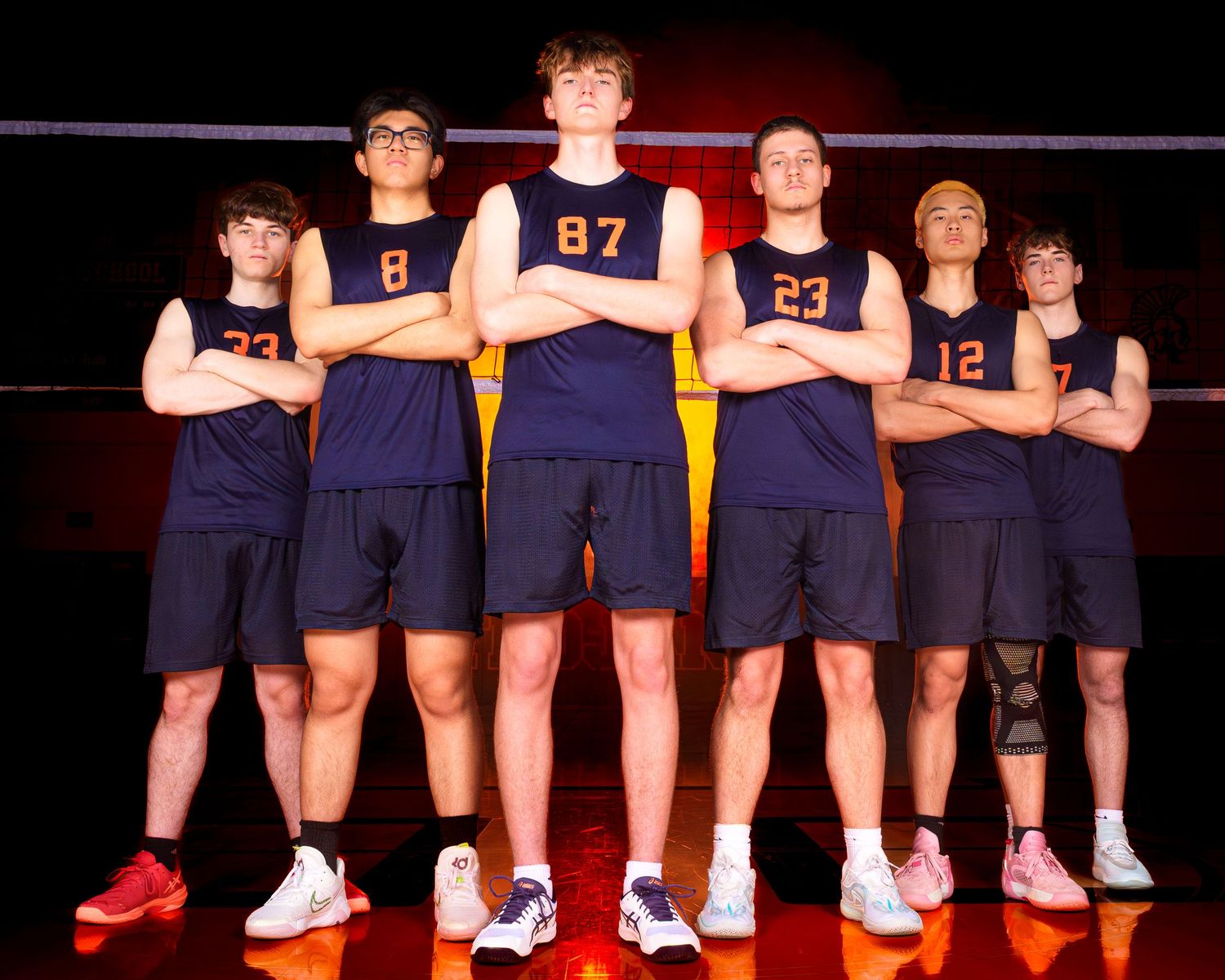 Hershey Trojans boys volleyball team Media Day group portrait with dramatic lighting, by Deanna Fox, SportsFox Photography, Hershey PA