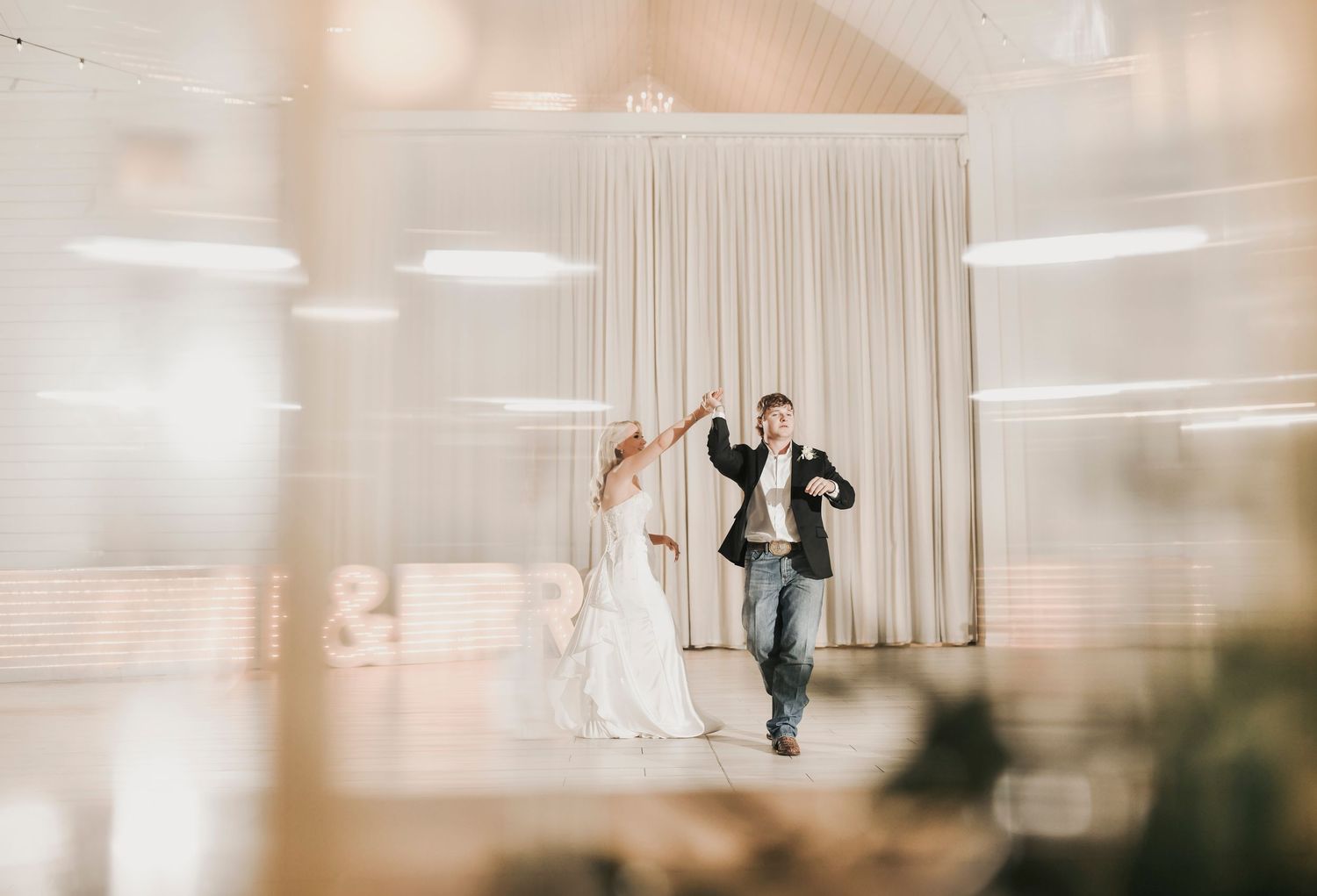 Bride and groom share romantic first dance at The Gardenia wedding venue