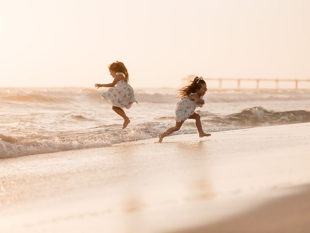 Family Vacation Photo by MJ Photograph on the best beach in Destin Florida during Sunset golden hour. Spring break photography specials