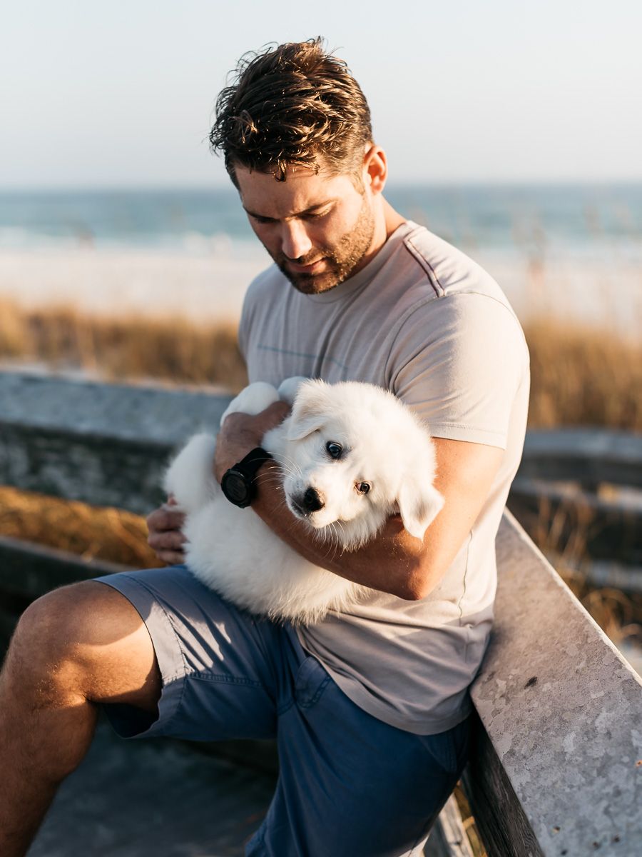 Playing on the beach during sunset with professional family photographer. Matt Johnson Photography