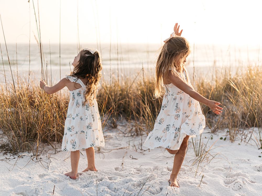 Family Vacation Photo by MJ Photograph on the best beach in Destin Florida during Sunset golden hour. Spring break photography specials