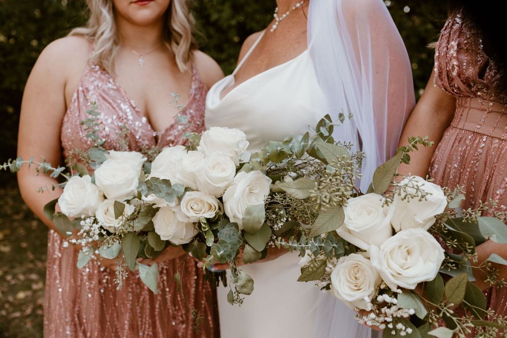 Simple white wedding bouquet for summer backyard wedding in Ohio photography by Vicci Photo Dayton Ohio Photographer
