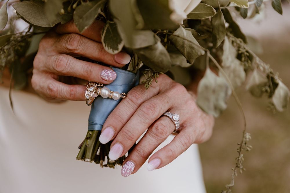 Bouquet detail shot with rings fastened to stems - for summer backyard wedding in Ohio photography by Vicci Photo Dayton Ohio Photographer