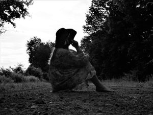 Artistic black and white silhouette photography in a natural outdoor setting.