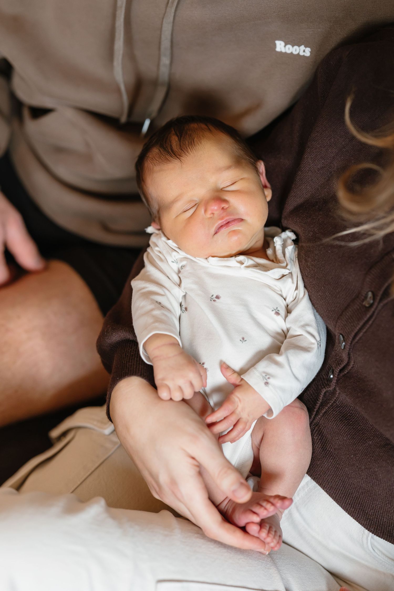 Candid sleeping baby photos during a newborn lifestyle photography photoshoot in a Kelowna, BC home.
