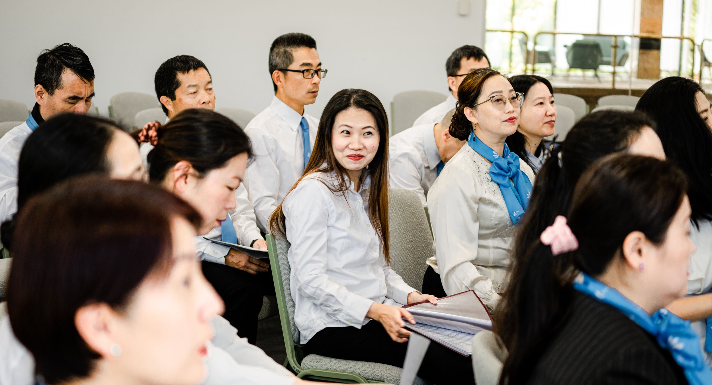 Students sitting in classroom during educational session.