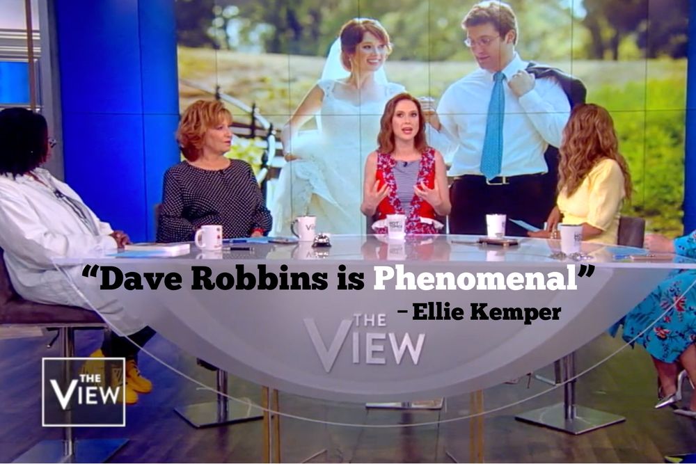 A television talk show panel discussing a wedding celebration.