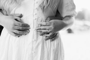 Series of black and white photos showing tender moments between a couple in intimate wedding portraits.