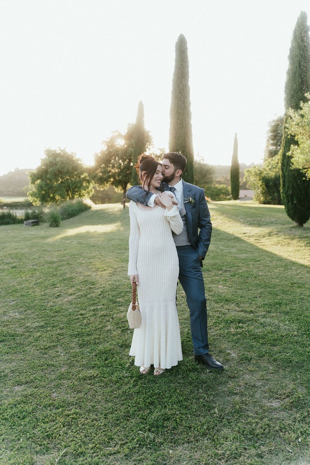 Luxury wedding photographer French Riviera capturing newlyweds in a Provence garden with cypress trees