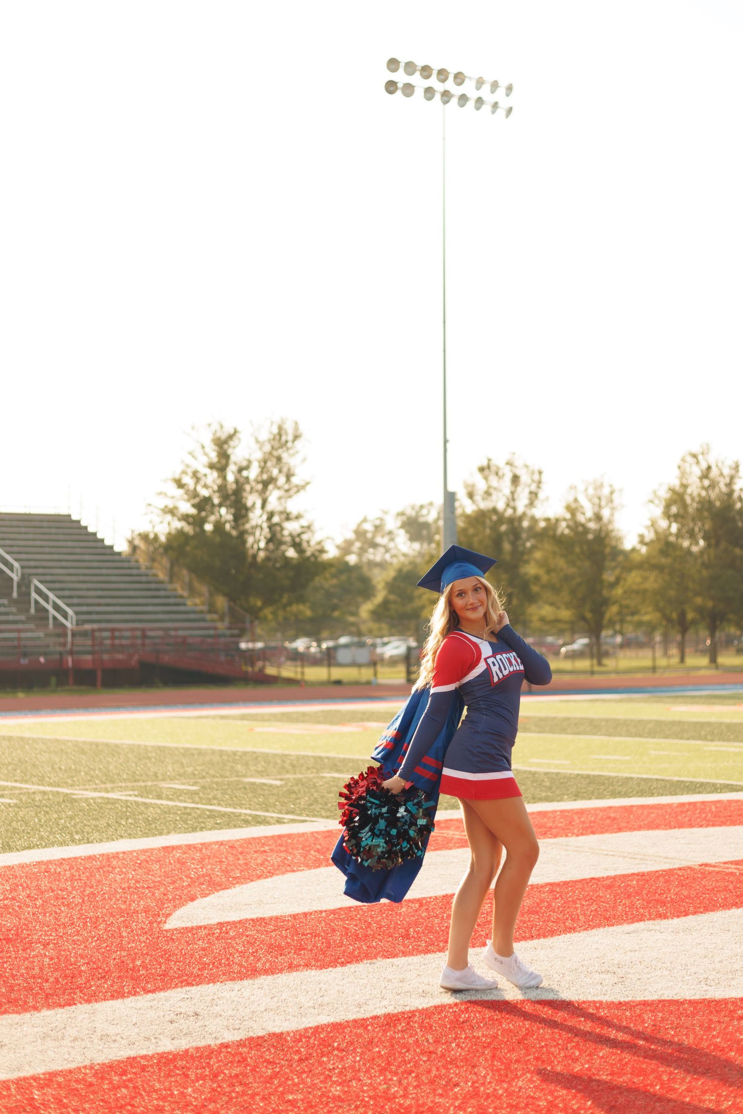 Cheerleading Senior Session. Cap & gown, Golden, Football field, Cheer outift