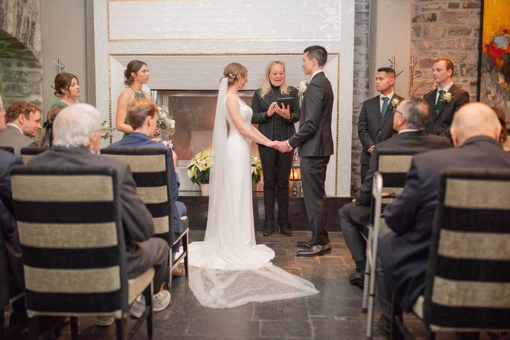Restaurant e18hteen wedding ceremony first kiss at fireplace